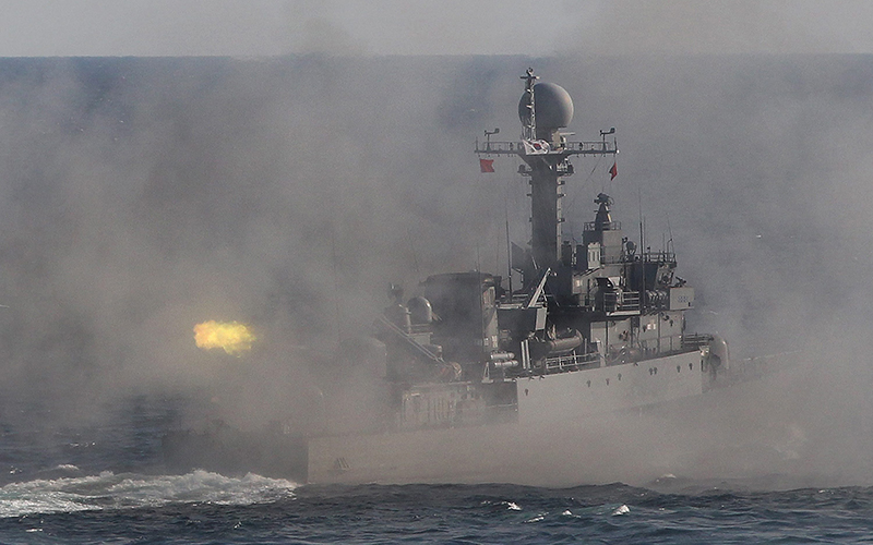 A South Korean navy patrol boat fires during an exercise off South Korea's southeastern coast near Busan, South Korea. South Korea's navy on Friday, May 27, 2016, fired warning shots to chase away two North Korean ships after they briefly crossed a disputed western sea boundary, Seoul defense officials said. 