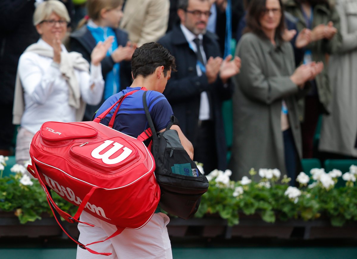 Canada's Milos Raonic leaves the court after losing his fourth round match of the French Open tennis tournament against Spains Albert Ramos-Vinolas at the Roland Garros stadium in Paris, France, Sunday, May 29, 2016. 