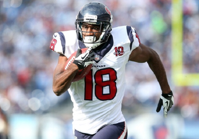 Former Houston Texans receiver Lestar Jean runs for a touchdown during a game against the Tennessee Titans.