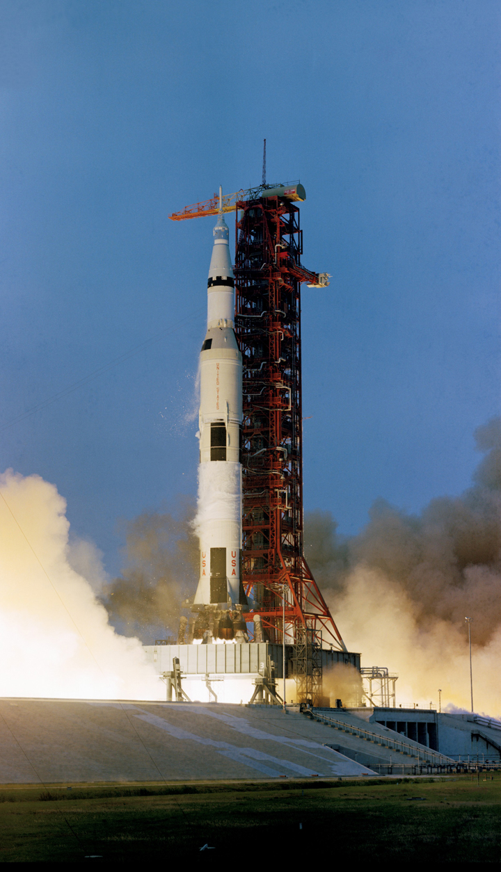 Apollo 13 lifts off
