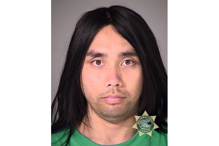 Avril Lavigne, also known as Romany Yves Mesina, is pictured a Multnomah County Sheriff's Office booking photo. 