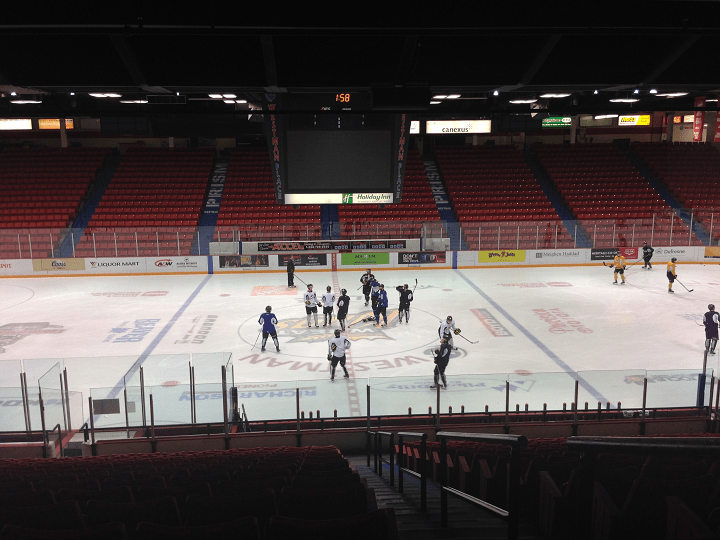 The Wheat Kings practice on the ice.