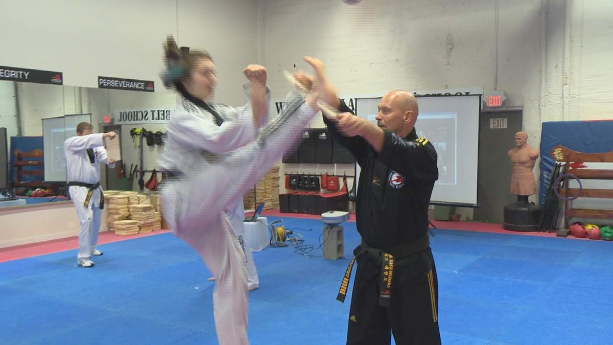 Martial arts students break boards for global cause - image