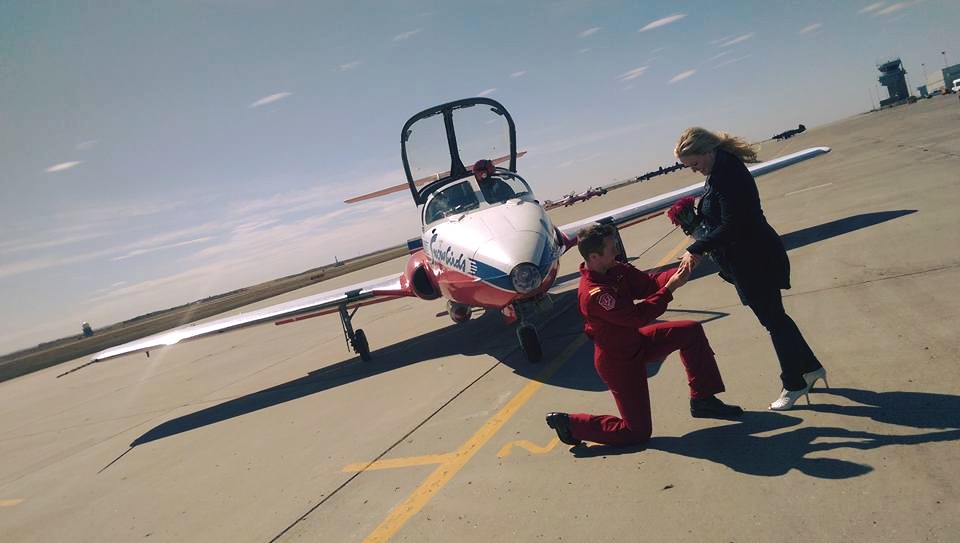 Capt. Greg Hume-Powell proposed to his girlfriend Emily Simpson during the Snowbirds home opener in Moose Jaw, Sask. on April 29. 