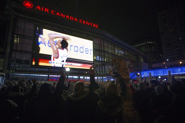 Fans watch Game 7 of an NBA first-round playoff basketball series between the Toronto Raptors and the Indiana Pacers in Toronto on Sunday, May 1, 2016. THE CANADIAN PRESS/Chris Young.