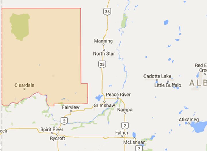 A wildfire burning in Clear Hills County in northwestern Alberta has forced some residents to be on alert to evacuate on short notice. 