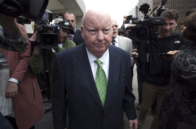 Sen. Mike Duffy leaves the courthouse after being acquitted on all charges Thursday, April 21, 2016 in Ottawa.