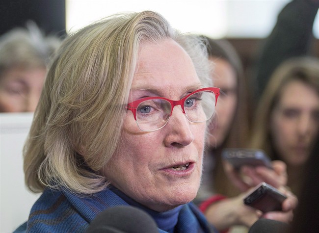 Federal Indigenous Affairs Minister Carolyn Bennett talks with reporters at a meeting of the Atlantic Policy Congress of First Nations Chiefs Secretariat in Halifax on Wednesday, in an April 27, 2016,.