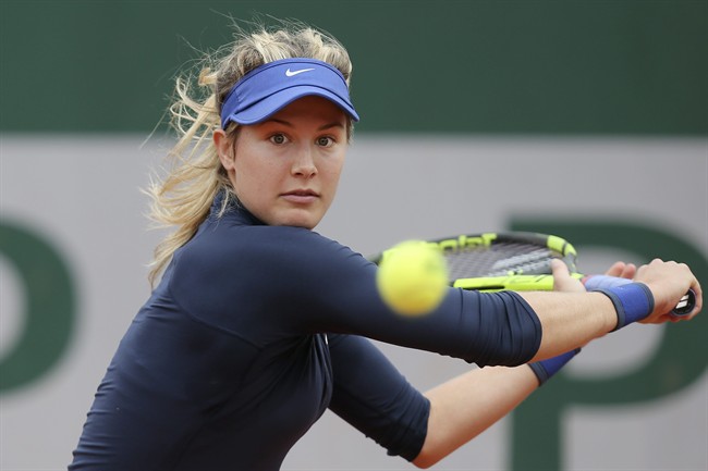 Canada's Eugenie Bouchard returns in her first round match of the French Open tennis tournament against Germany’s Laura Siegemund at the Roland Garros stadium in Paris, France, Tuesday, May 24, 2016.