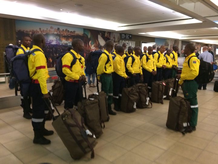 About 300 firefighters from South African arrived in Edmonton to go to Fort McMurray to help battle the wildfire.