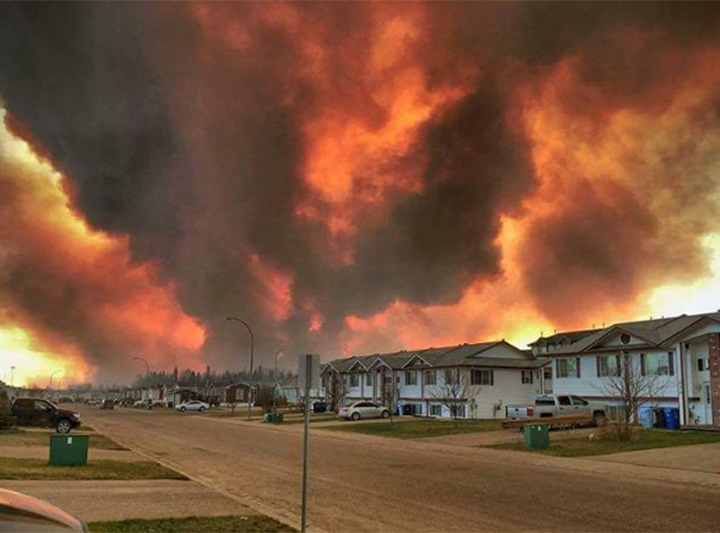 A raging wildfire has forced the evacuation of the entire northern Alberta city of Fort McMurray, and the evacuees of the oilsands city have captured unbelievable scenes as they escaped the inferno.
