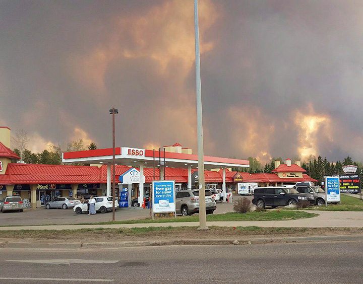 A wall of fire rages outside of Fort McMurray, Alta. Tuesday May 3, 2016.