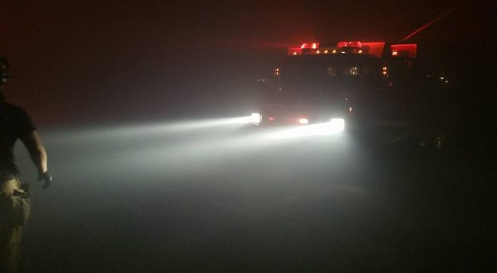 Firefighters work through the night to battle the Fort McMurray wildfire. Uploaded to Facebook by a firefighter and EMT with the Regional Municipality of Wood Buffalo on May 6, 2016. Date and exact location of photo is unknown.