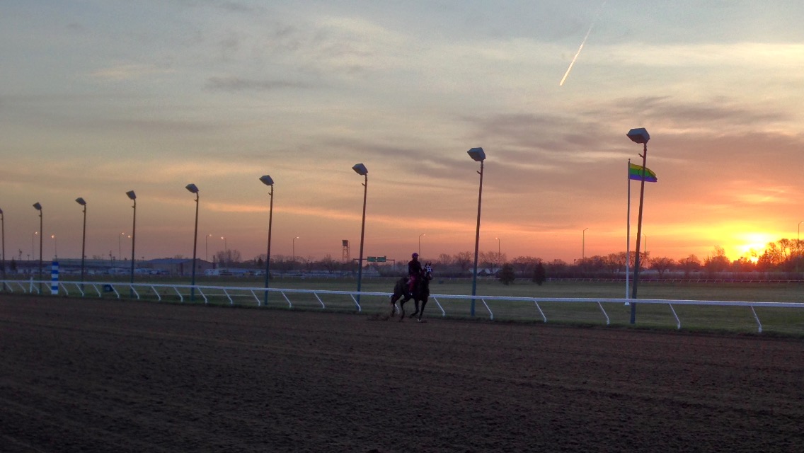 One racer takes to the track at sunrise Friday morning.