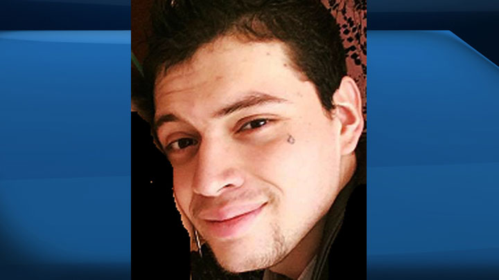Saskatoon police have released an updated photo of Miguel Gomez, 20, who is wanted in connection to a homicide in the city last month.