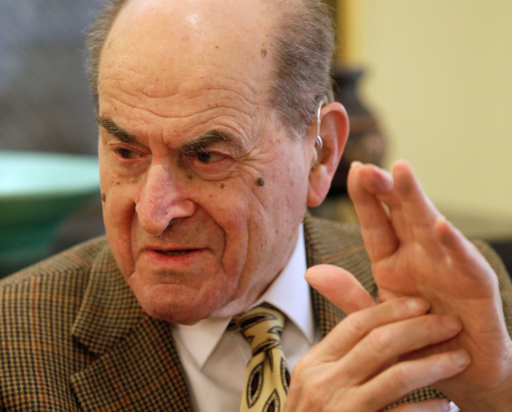  In this Feb. 5, 2014 file photo, Dr. Henry Heimlich describes the maneuver he developed to help clear obstructions from the windpipes of choking victims, while being interviewed at his home in Cincinnati.