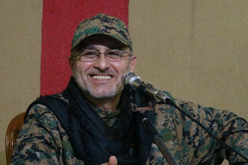 This undated handout image released on Friday, May 13, 2016, by Hezbollah Media Department, shows slain top military commander Mustafa Badreddine smiling during a meeting. Lebanon's militant Hezbollah group said its top military commander Mustafa Badreddine was killed in Syria. 