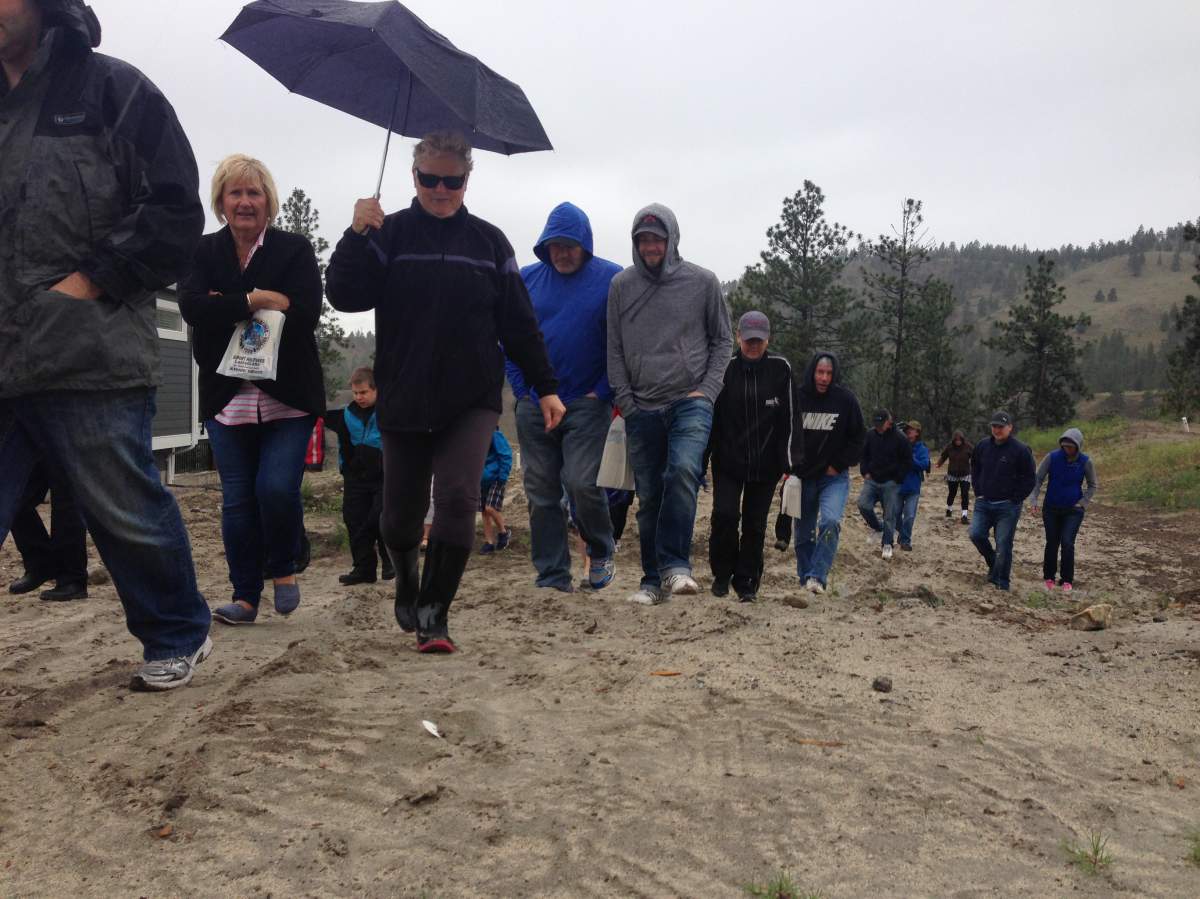 Penticton residents tour Sendero Canyon as part of a fire safety information session on Sunday afternoon.