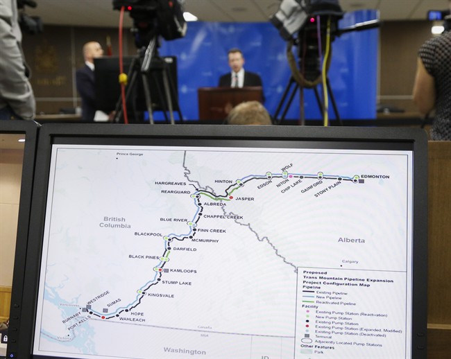 A map of the Kinder Morgan Trans Mountain pipeline is seen in the foreground of this file photo.