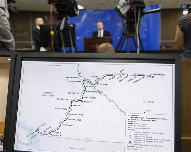 A map of the Kinder Morgan Trans Mountain pipeline is seen in the foreground of this file photo.