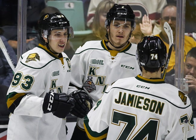 London Knights' Mitchell Marner, left, celebrates his goal with teammates Matthew Tkachuk, centre, and Aiden Jamieson during second period CHL Memorial Cup hockey action against the Red Deer Rebels in Red Deer, Friday, May 20, 2016.