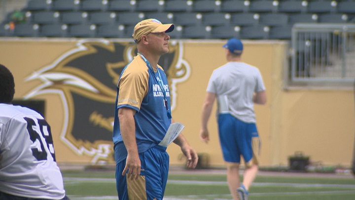 Winnipeg Blue Bombers offensive coordinator Paul LaPolice watches players during the team's rookie camp.