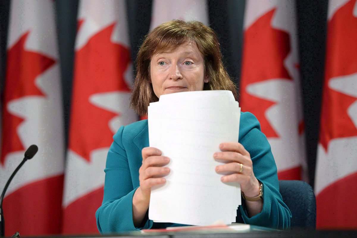 Suzanne Legault, Information Commissioner of Canada, holds a press conference in the National Press Theatre in Ottawa on March 31, 2015. Federal agencies are declaring records to be cabinet secrets more often - placing them completely out of public reach and giving the information watchdog reason to believe the stamp of confidentiality is being overused. THE CANADIAN PRESS/Sean Kilpatrick.