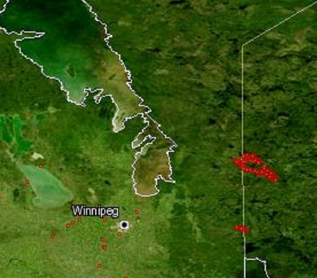 Satellite data released  by NASA paints a detailed portrait of wildfires closing in on Manitoba Tuesday.