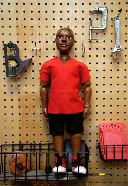 In this Tuesday, April 26, 2016 photo a prototype doll named Jaylen, created by Babson .