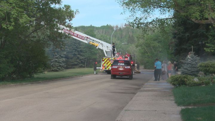 Firefighters battle a blaze in Edmonton's Mill Creek Ravine on May 6, 2016.