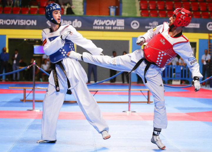 Belgian taekwondo champion Mourad Laachraoui, right,  fights Spaniard Jesus Tortosa at the European Taekowndo Championships in Montreaux, Switzerland on May 19, 2016. 