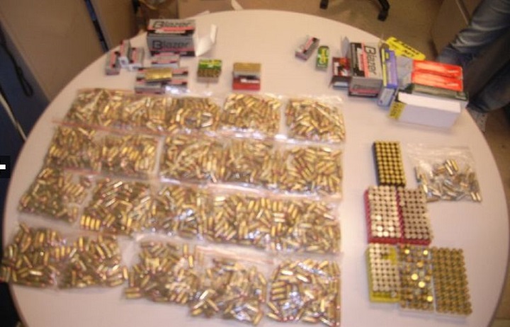 Rifle with 2,500 rounds of ammo seized when police raid Scarborough home - image