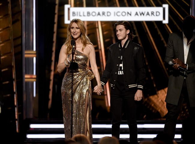 Rene-Charles Angelil presents the Icon Award to his mother, Celine Dion, at the Billboard Music Awards at the T-Mobile Arena on Sunday, May 22, 2016, in Las Vegas.