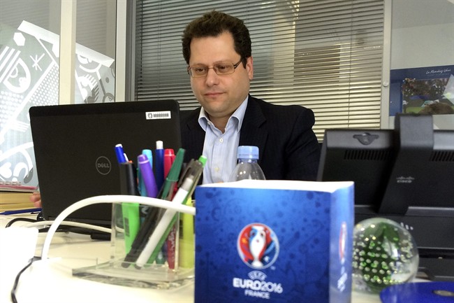 Ziad Khoury, the security director for the Euro 2016 soccer championships, works in his office after responding to questions during an Associated Press interview, Tuesday, May 17, 2016 in Paris. Khoury said anti-drone technology would be deployed over stadiums as part of the security measures to protect the tournament. 