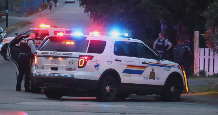 Police on the scene of an alleged assault and hostage situation in Surrey on May 26.