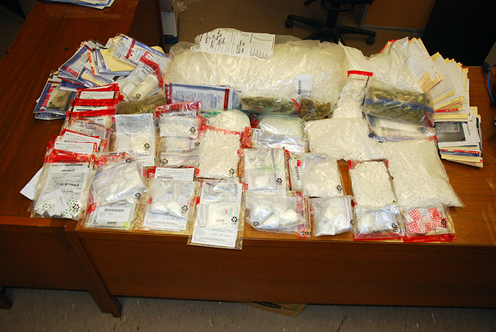 Investigators seized 57,792 methamphetamine pills, 7,229 oxycodone pills, 706 grams of cocaine, 476.6 grams of marijuana
and 154.25 fentanyl patches after raids across northeastern Ontario.
