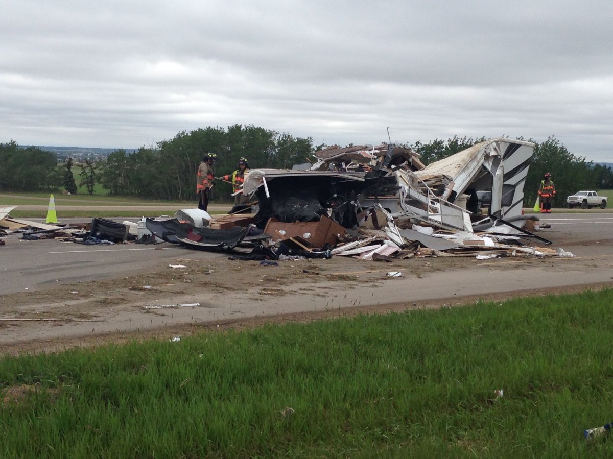 Wreckage after Red Deer crash shuts down Alberta’s QEII Highway