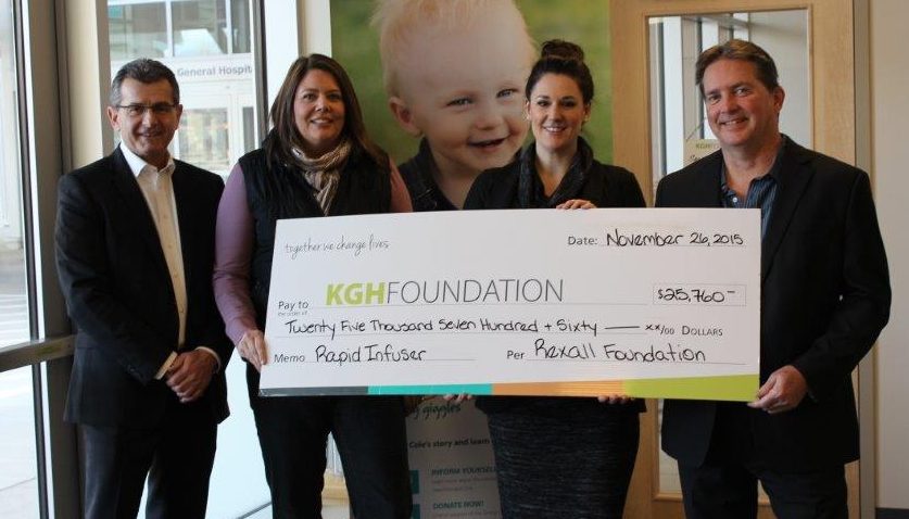 The KGH Foundation accepting a $25,760 donation from the Rexall Foundation. 