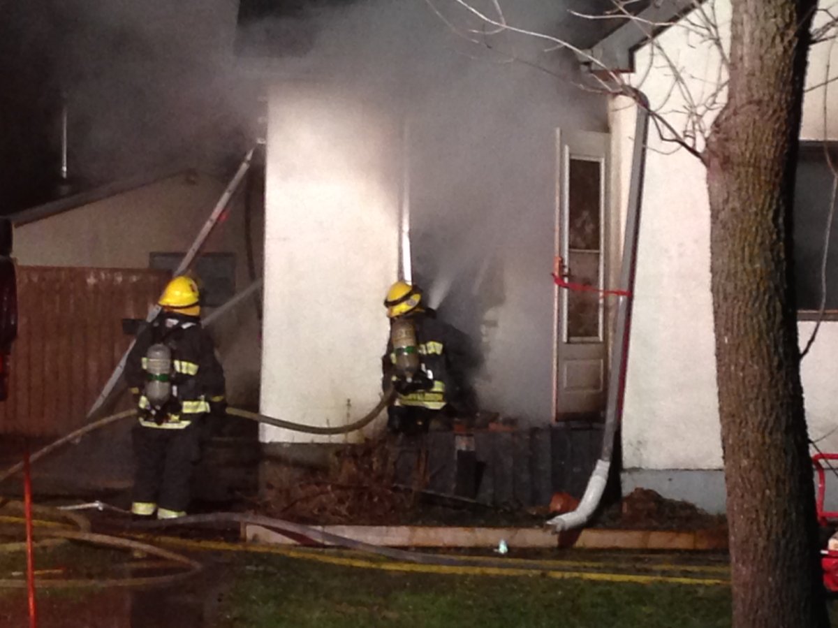 Winnipeg fire crews battle blaze on Roberta Avenue early Wednesday morning.