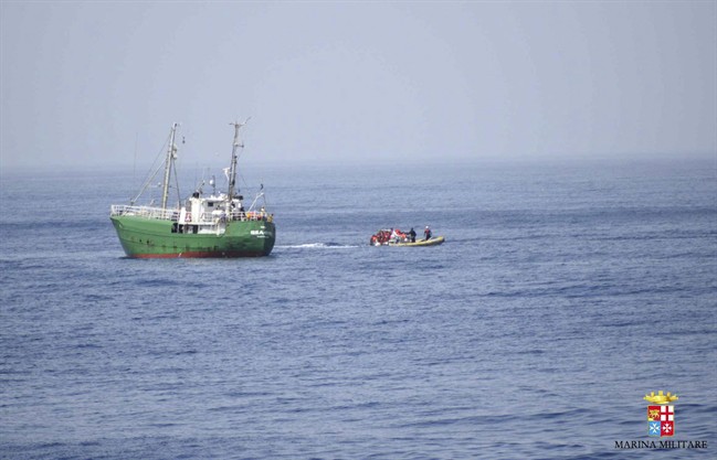 This undated image shows migrants being rescued at sea.