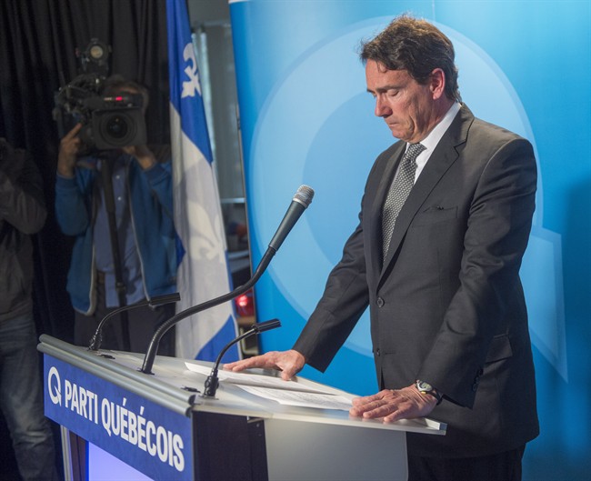 Parti Québécois leader Pierre Karl Péladeau reacts during a news conference in Montreal, Monday, May 2, 2016, where he announced he is quitting politics for family reasons.