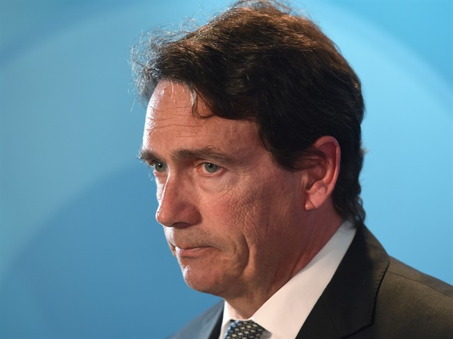 Parti Québécois leader Pierre Karl Péladeau reacts during a news conference in Montreal, Monday, May 2, 2016, where he announced he is quitting politics for family reasons.