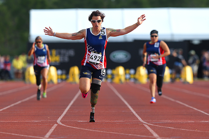 ORLANDO, FL - MAY 10:  Sarah Rudder crosses the finish line in first place during the Invictus Games Orlando 2016 Track & Field Finals at the ESPN Wide World of Sports Complex on May 10, 2016 in Lake Buena Vista, Florida. 