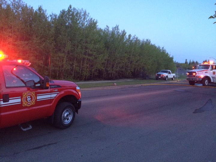 Fire crews arrive at a brush fire in Sherwood Park on May 10, 2016.