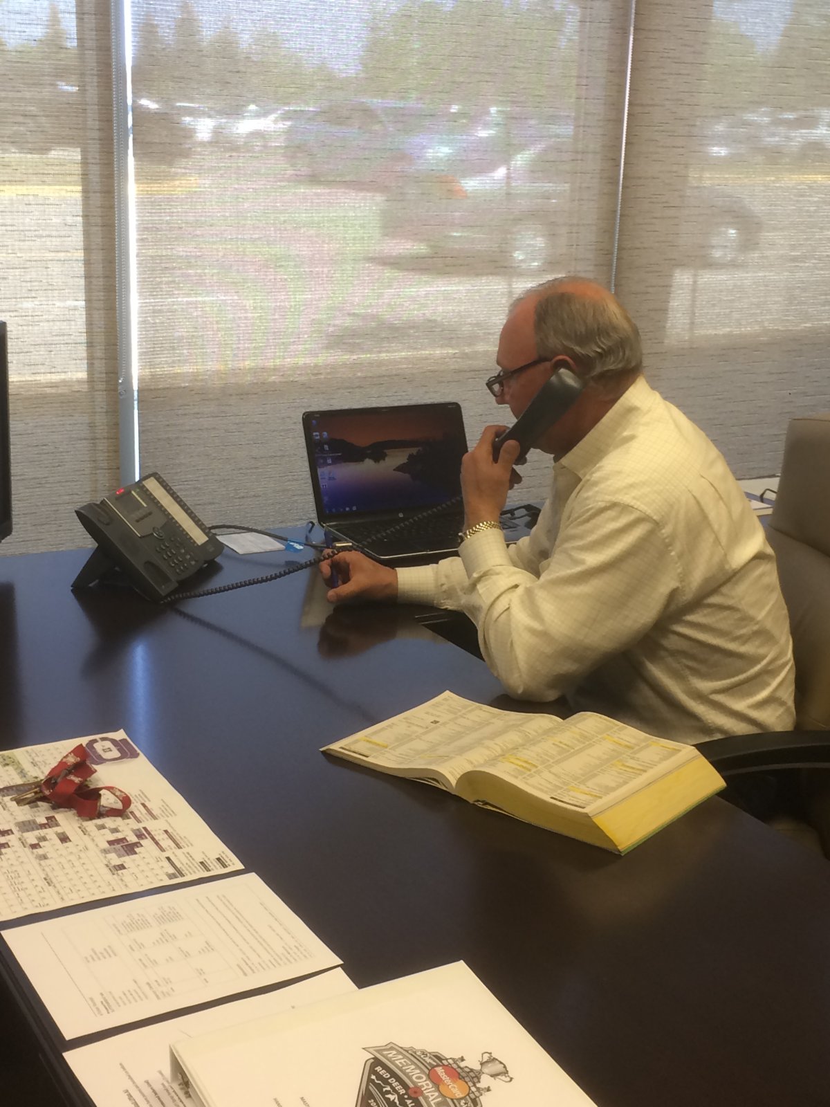 Brent Sutter works in his Red Deer Rebels office ahead of the 2016 MasterCard Memorial Cup.