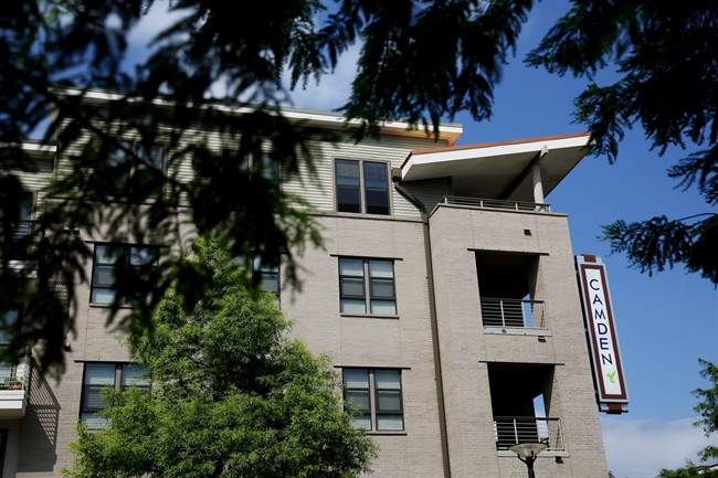 Trees frame the exterior of the Camden Belmont Apartments in Dallas, Saturday May 28, 2016.
