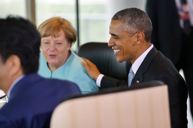 German Chancellor Angela Merkel, center, and U.S. President Barack Obama, right, talk chat during the second working session during the 2016 Ise-Shima G7 Summit in Shima, Japan, Thursday, May 26, 2016. (Carlos Barria/Pool Photo via AP).