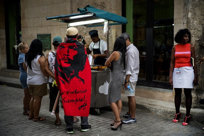 A street stall selling churros in Havana, Cuba, Monday, May 23, 2016.