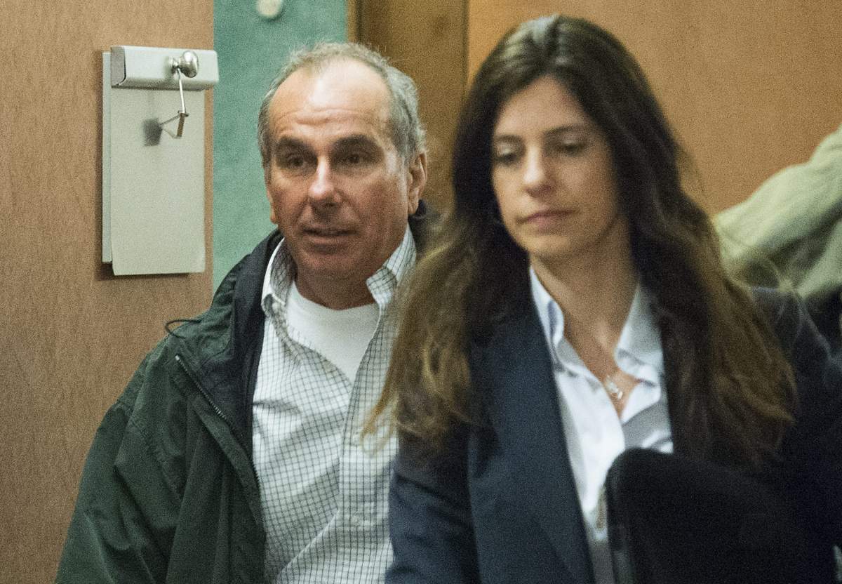 Cinar Corp co-founder Ronald Weinberg leaves the Montreal Courthouse, Monday, May 12, 2014.