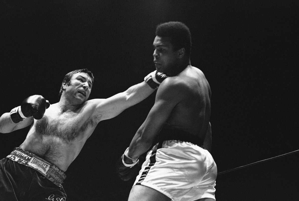 FILE - In this May 1, 1972, file photo, George Chuvalo connects with a left to the head of Muhammad Ali in the first round of their scheduled 12-round fight in Vancouver. 